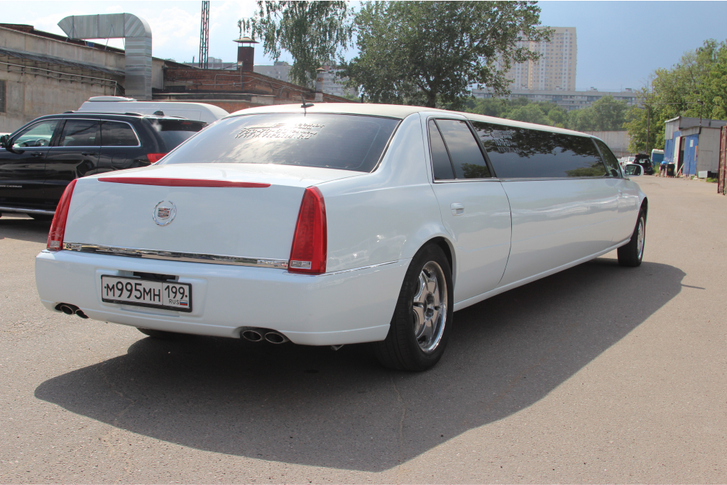 Арендовать белый Cadillac DTS